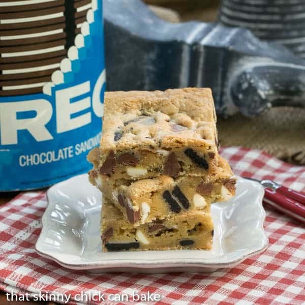 3 Oreo Chocolate Chip Bars stacked on a white plate.