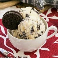 White cup of Oreo Ice cream on a red and white napkin