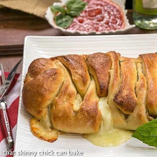 Braided Stromboli on a white serving tray