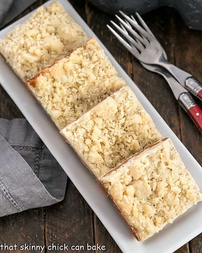 Overhead view of caramel bars on a white tray