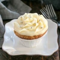 Vanilla cupcake on a square white plate