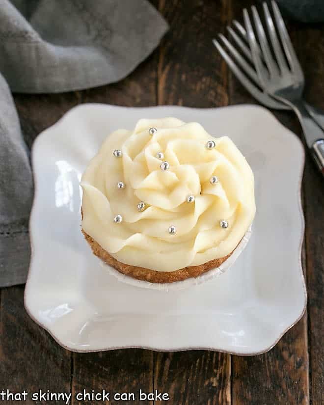 Overhead view of an Easy Vanilla Cupcake on a white plate