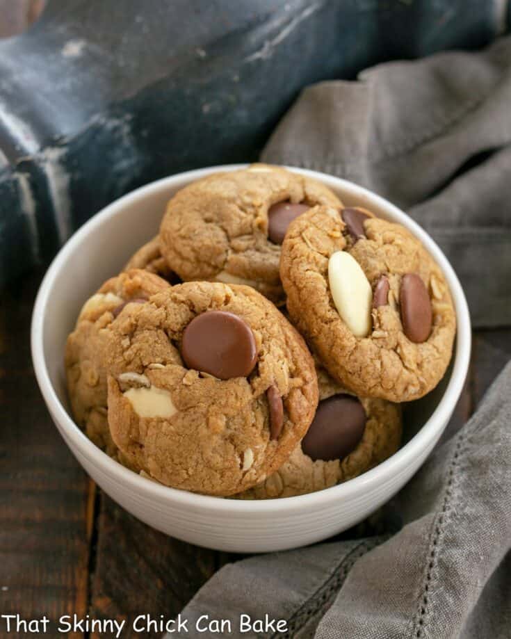 Homemade Oatmeal Cookies with Chocolate Chunks in a white bowl.