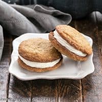 2 Oatmeal Creme PIes on a square white plate