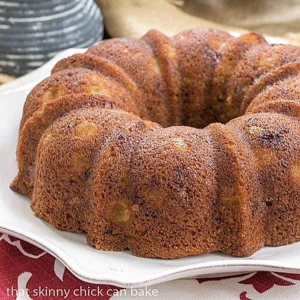 Apple Ginger Coffee Cake on a white serving plate