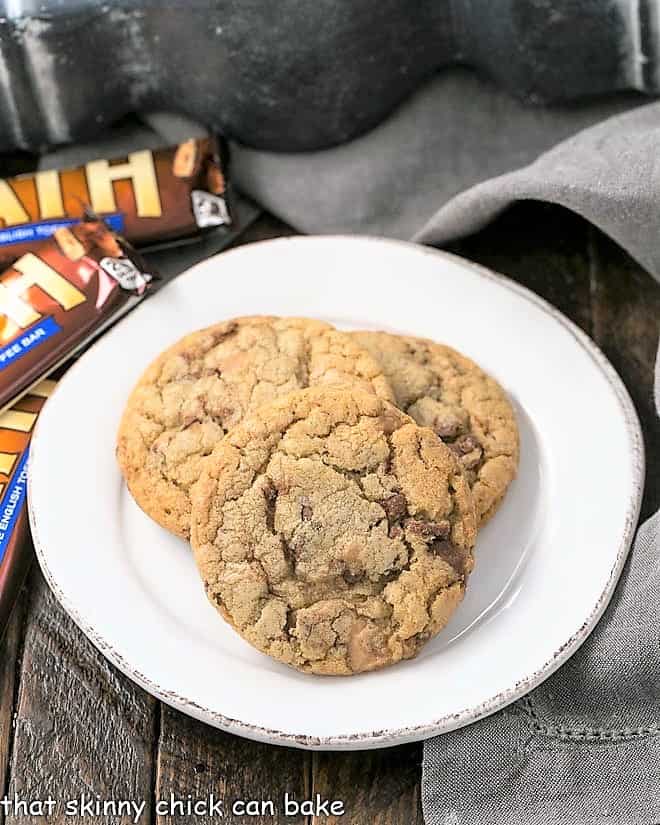 Brown Butter Toffee Cookies on a round white plate.