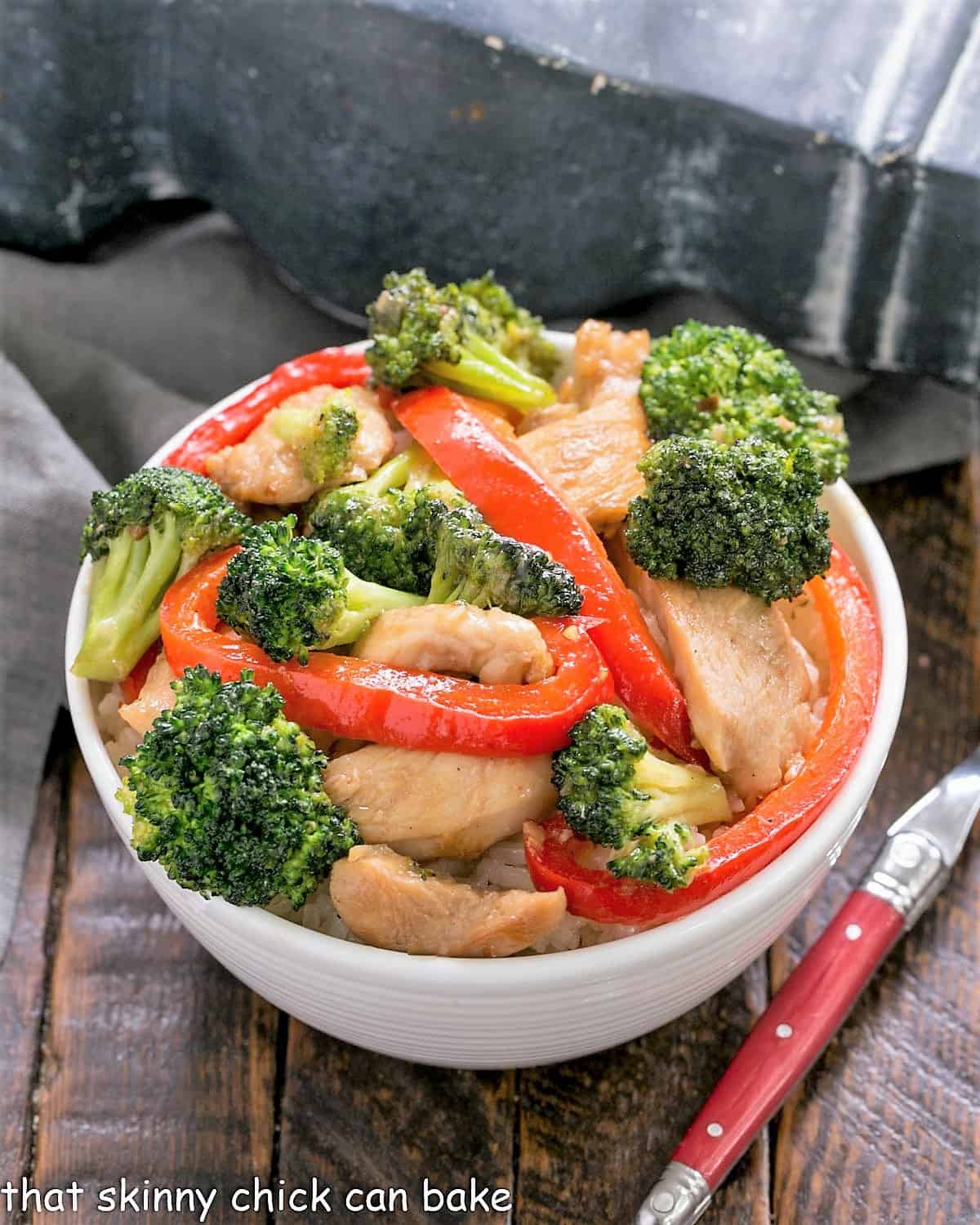 Easy Chicken Stir Fry viewed from above with a red handled fork.
