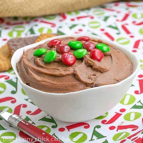 Brownie Batter Dip in a white bowl topped with M&M's