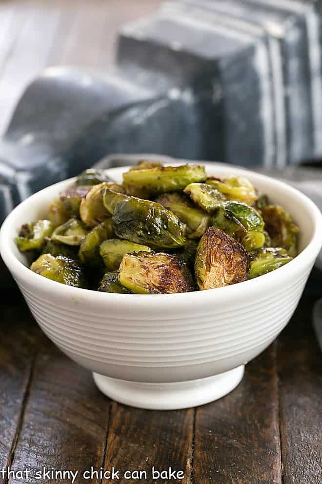 Honey Balsamic Brussels Sprouts in a white serving bowl.