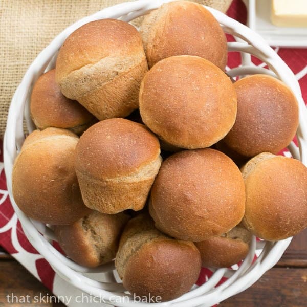 Whole Wheat Dinner Rolls in a ceramic basket