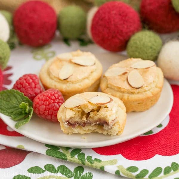 Almond Raspberry Tartlets | Raspberry jam and almond paste fill cream cheese pastry tartlets