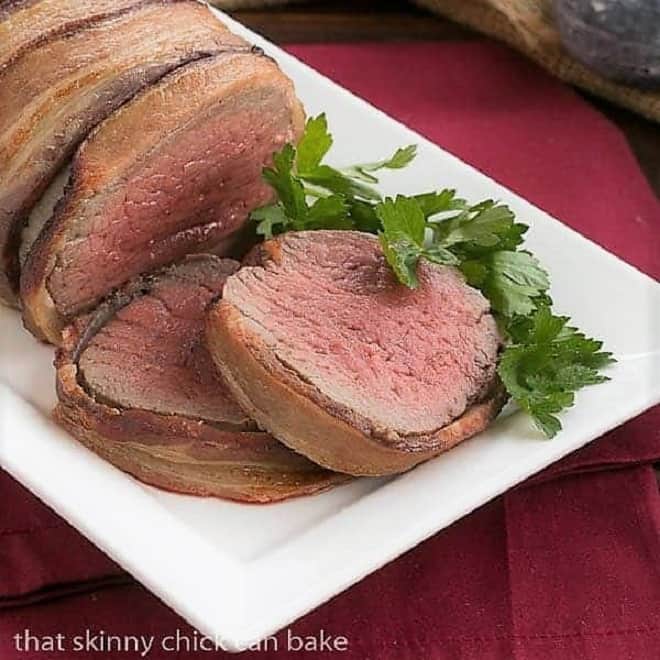 Two slices of beef tenderloin warpped in bacon