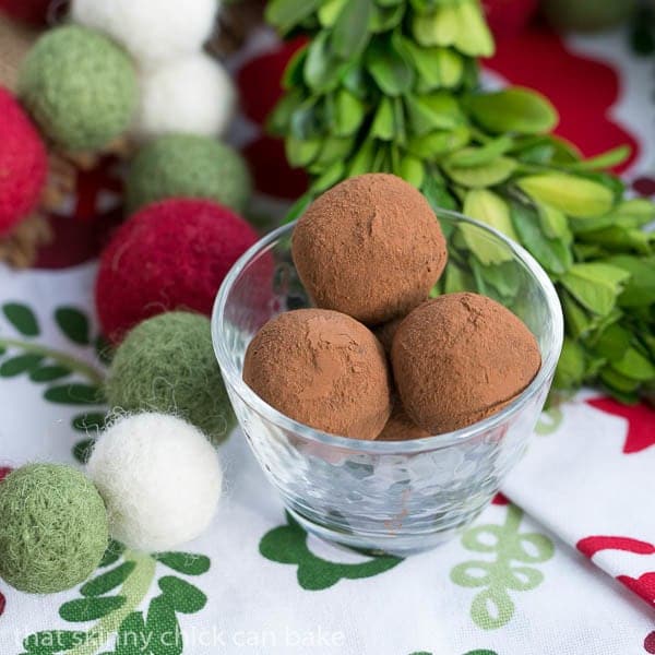 Caramel Filled Chocolate Truffles in a glass candy dish.