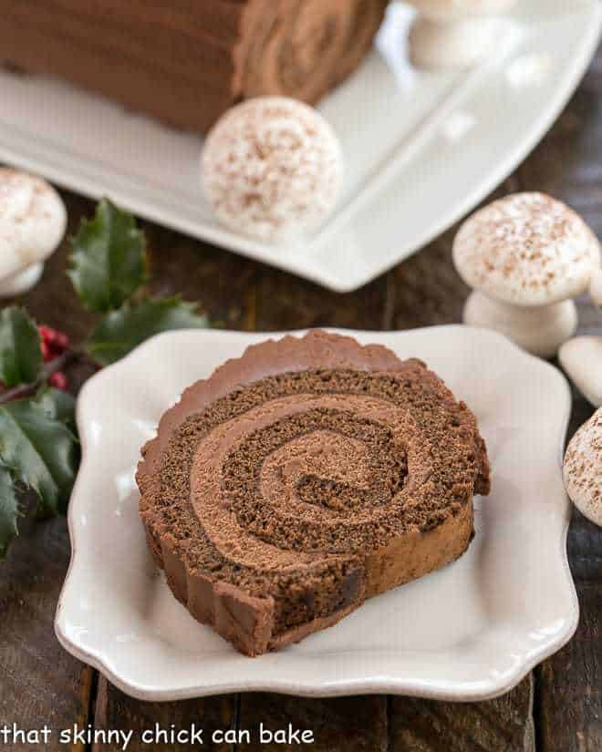 Bouche de Noel slice on a square plate.