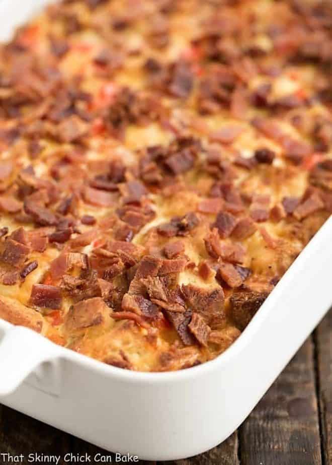 Easy Bacon and Egg Strata in a white ceramic casserole dish.