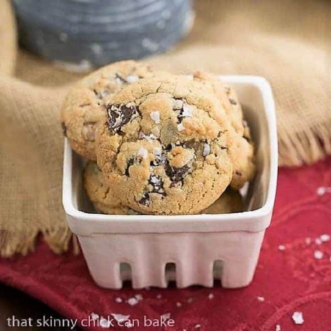 Salted Toffee Chocolate Chunk Cookies in a square ceramic dish