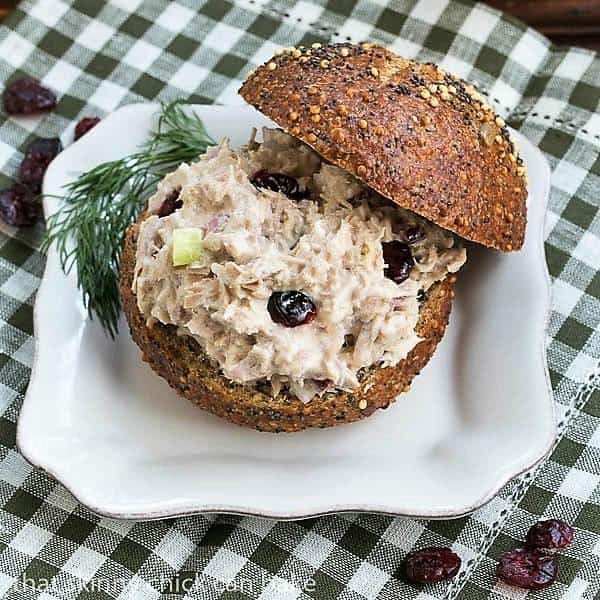 Tuna, Cranberry, Pecan Salad Sandwich on a white plate