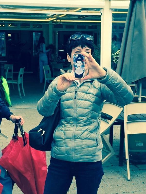 Liz taking photos in Queenstown, New Zealand Liz with iphone