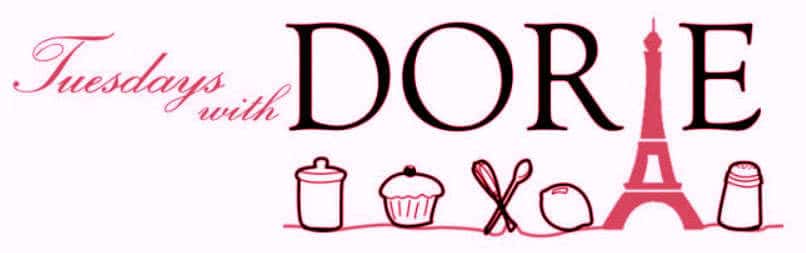 Tuesdays with Dorie logo in black and pink lettering with a cupcake, spoons, lemon, Eiffel tower and more