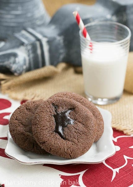 Chocolate Lava Cookies plated with a glass of milk