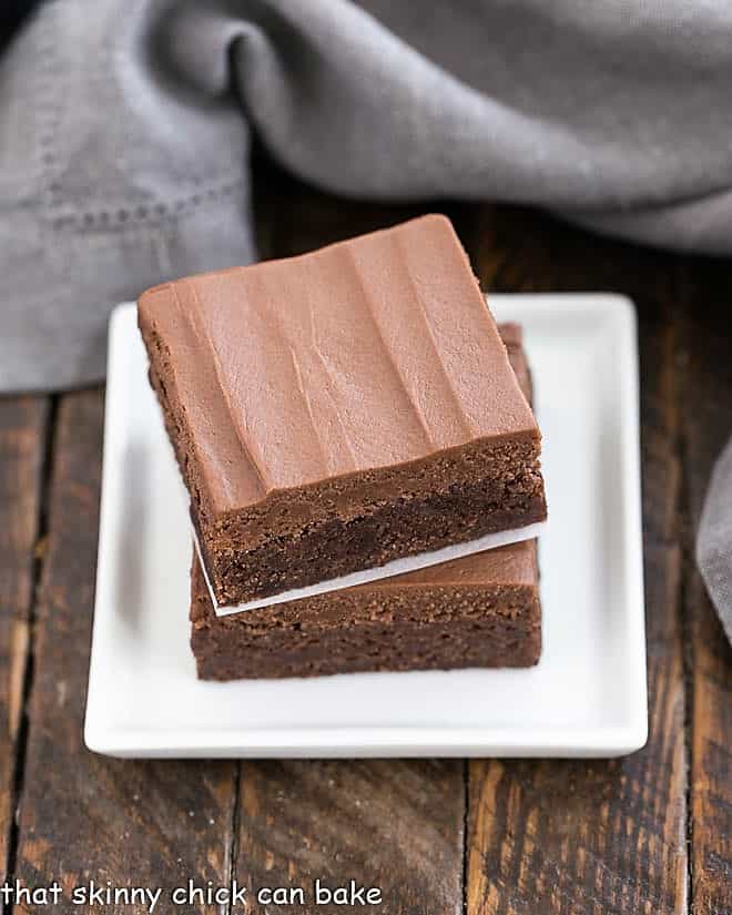  Frosted Brownies Recipe stacked on a small white plate