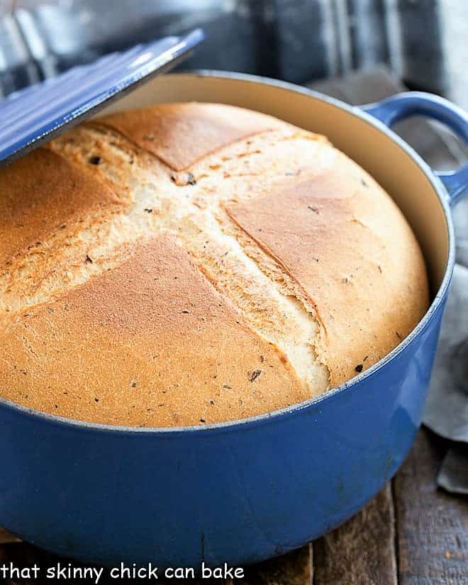 Rosemary Olive Bread in a blue Dutch oven