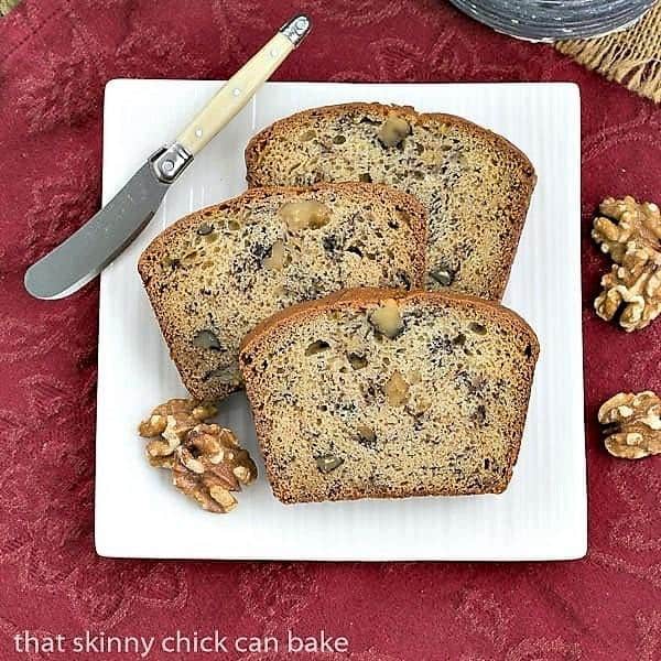 Classic Banana Walnut Bread on a square white plate.