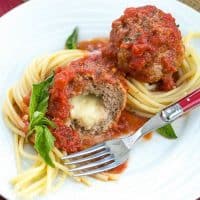 Mozzarella Stuffed Meatballs | Tender meatballs filled with gooey mozzarella
