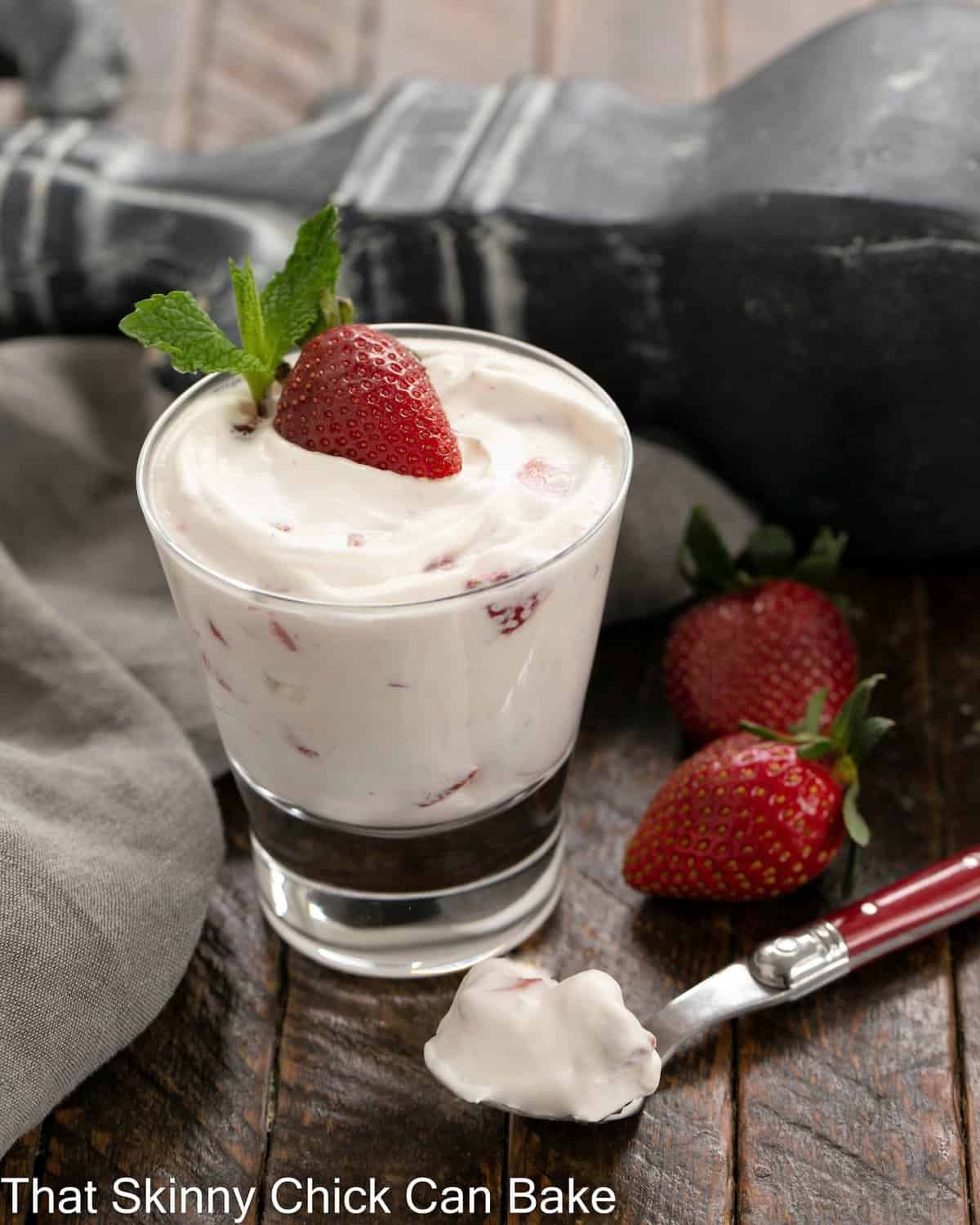 No-Bake Strawberry Fool with a spoon with a bite removed in the foreground.