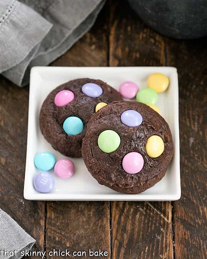 Overhead view of 2 Easter brownie cookies with pastel M&Ms