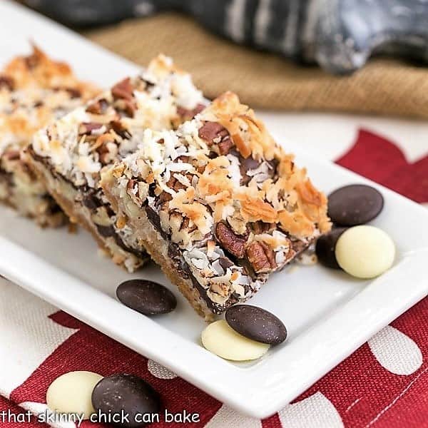 The Best Magic Cookie Bars on a rectangular, white tray