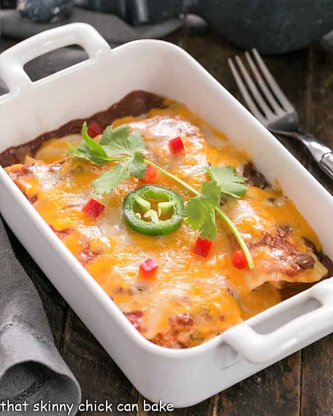 2 Tex Mex Manicotti in a small ceramic baking dish