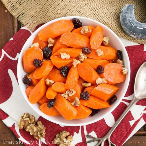 Overhead view of Orange Glazed Carrots - Carrots with a sweet orange glaze, walnuts and dried cranberries