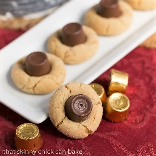 Peanut Butter Rolo Blossoms on a white ceramaic tray