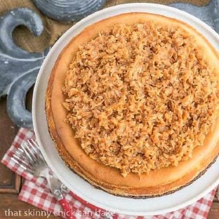 Samoa Cheesecake with a Coconut Caramel Topping on a white plate