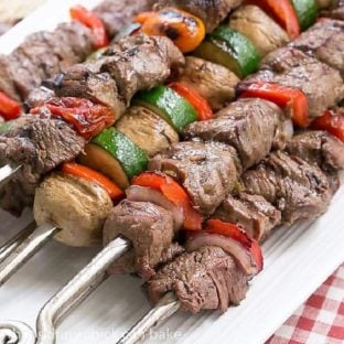 Beef Teriyaki Kabobs on a white platter