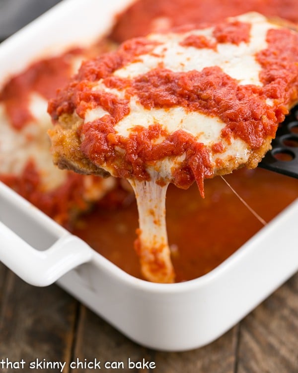 Chicken Parmesan A terrific weeknight dinner of breaded chicken topped with cheese and marinara.