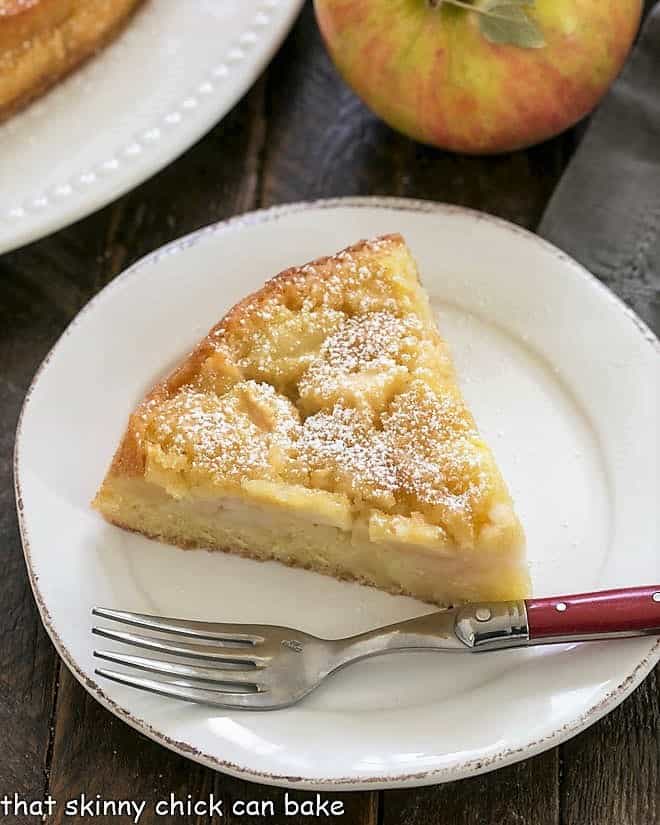 Overhead view of a slice of French apple cake.