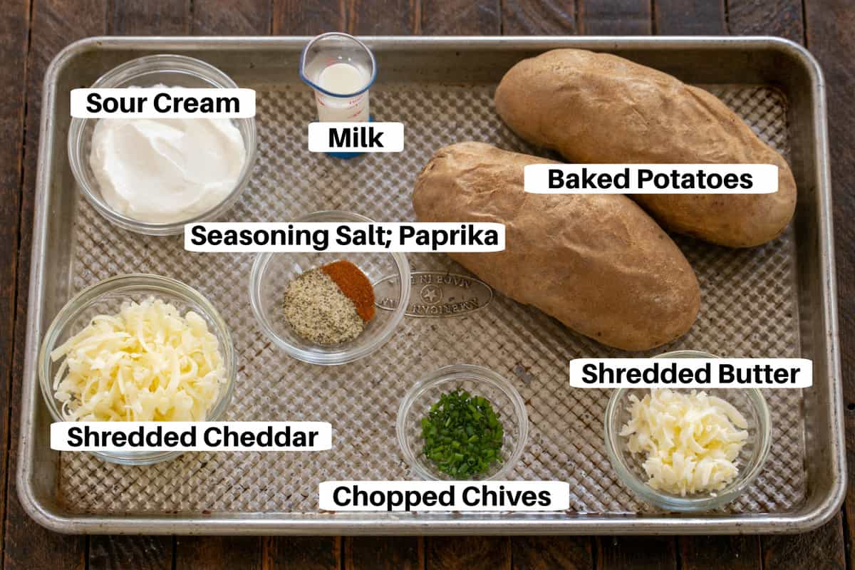 Twice Baked Potatoes ingredients with labels on a sheetpan.