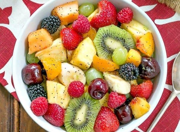 Honey Lime Fruit Salad | Scrumptious fresh fruit dressed with honey, lime juice, vanilla and poppy seeds