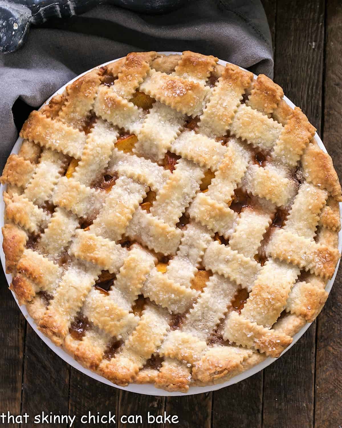 Overhead view of a Classic Peach Pie with a lattice crust.