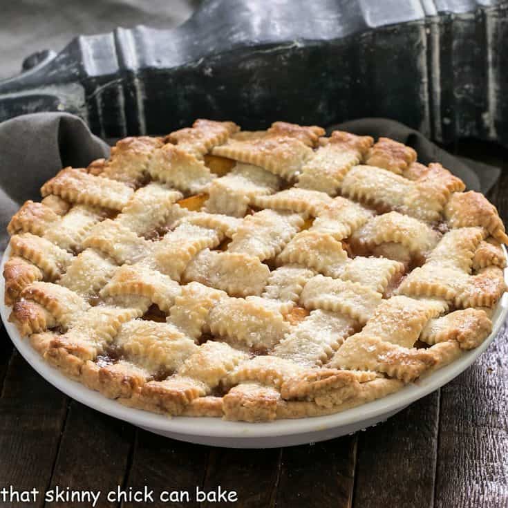 Side view of lattice topped peach pie recipe