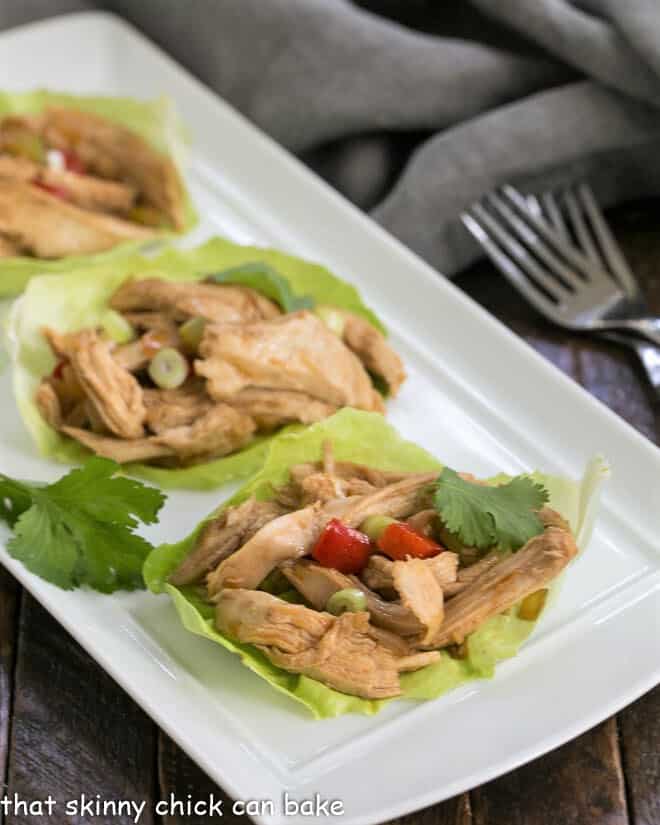 Shredded Chicken Lettuce Wraps on a white tray.