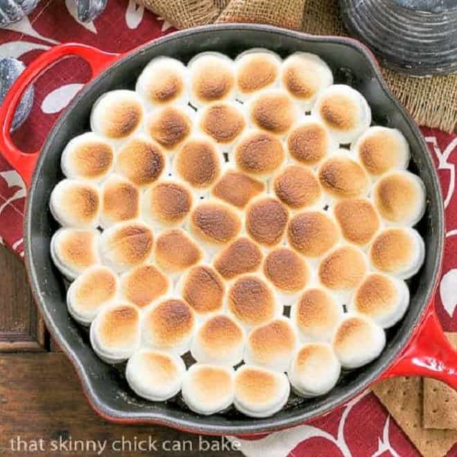 Overhead view of S'mores Dip in a red skillet.