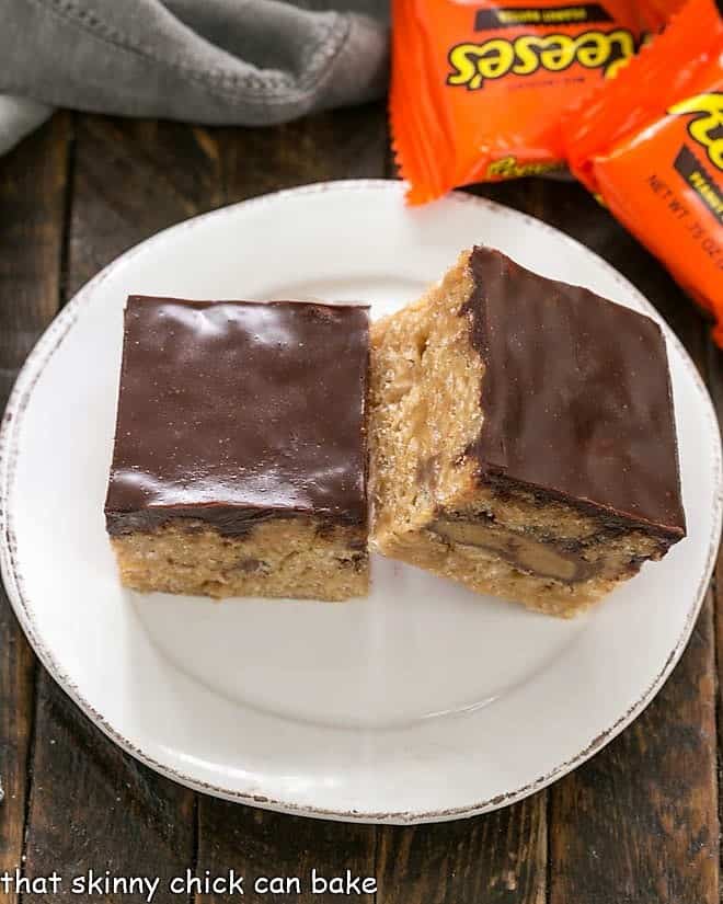 Two Stuffed Peanut Butter Rice Krispie Treats on a round white plate