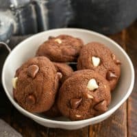 5 chocolate chocolate chip cookies in a white bowl