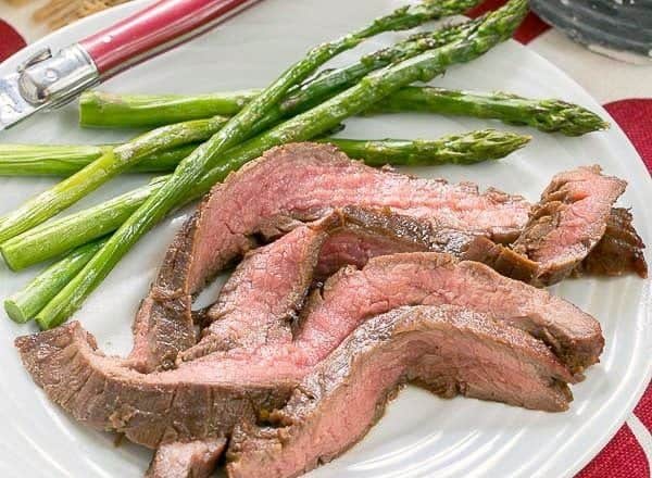 Easy Grilled Flank Steak - Marinate with pantry ingredients overnight, then toss on the grill for a terrific entree