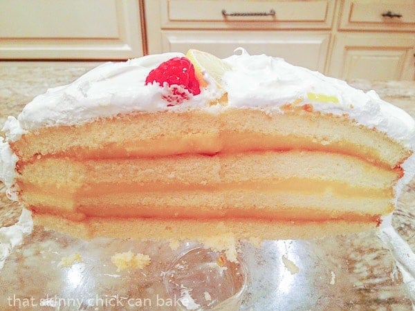 Lemon Layer Cake - 4 layers of vanilla cake filled with lemon curd and topped with a lemony Swiss meringue Lemon Layer Cake