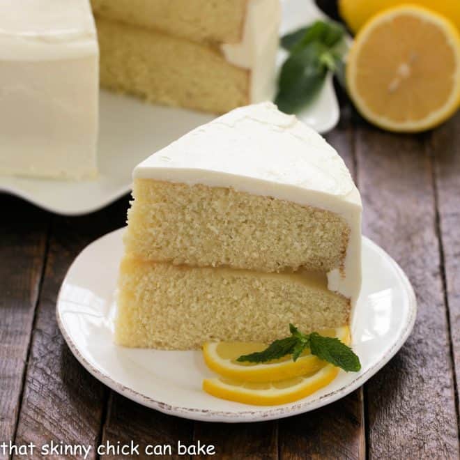 Lemon Layer Cake slice on a white dessert plate