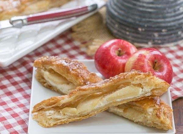 Maple Glazed Apple Tart | Puff pastry, sweetened cream cheese, apples and a maple glaze make for a spectacular breakfast or dessert